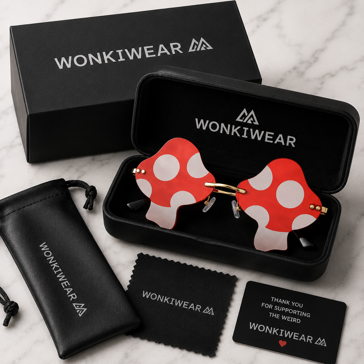Red mushroom shaped festival glasses in premium WonkiWear gift box