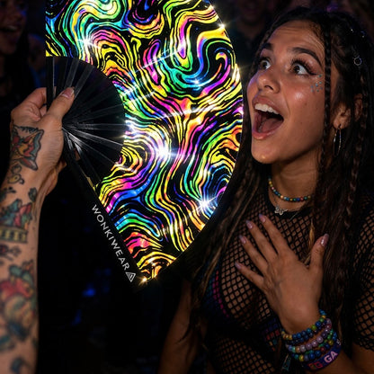 WonkiWear reflective swirl rave fan glowing under festival and concert lighting
