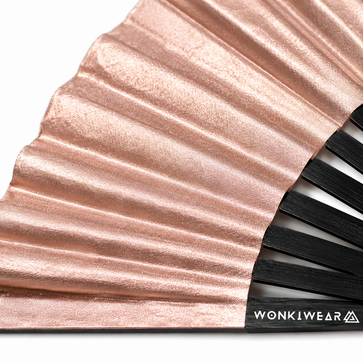 Close-up showing metallic rose gold shimmer texture on WonkiWear XL festival fan