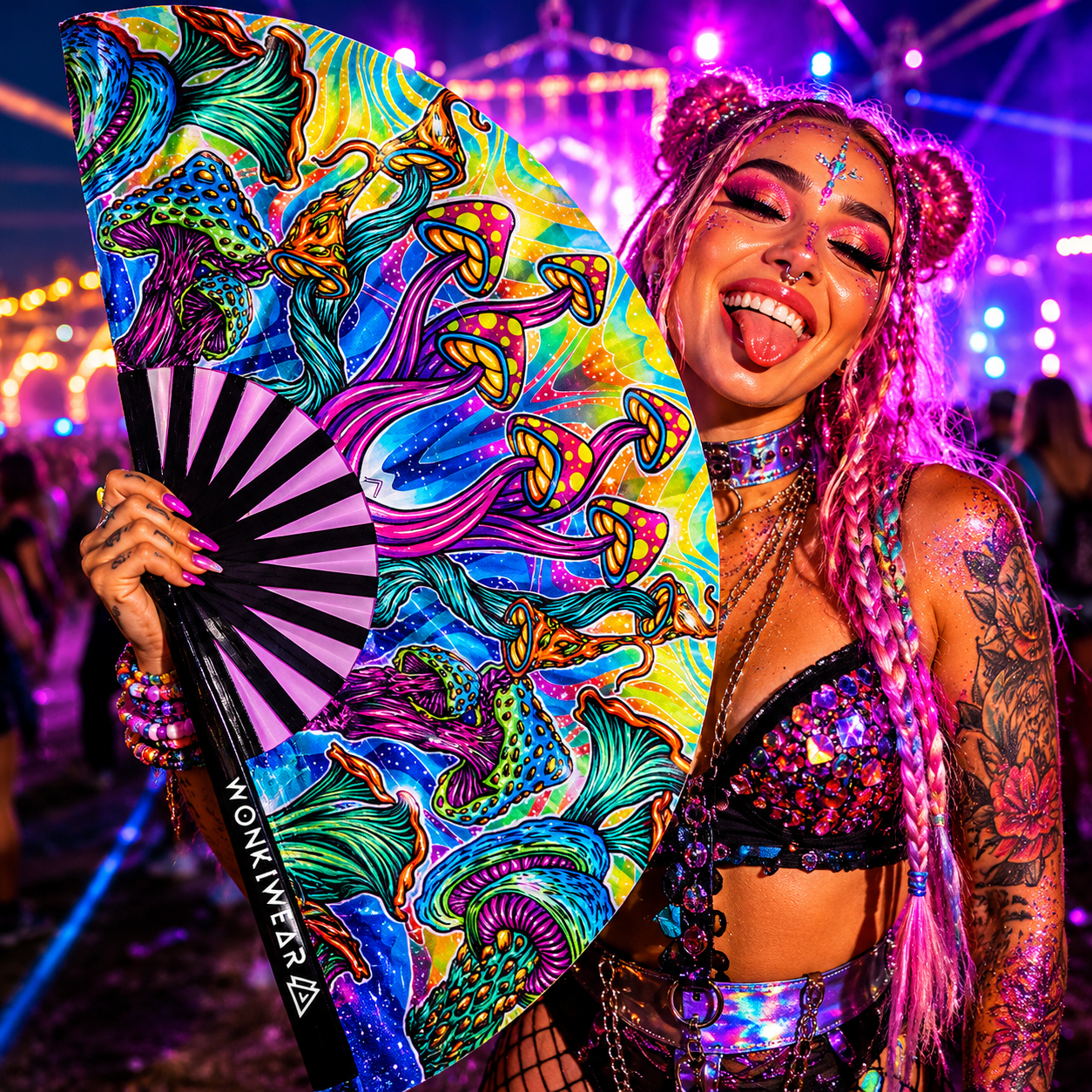 Festival model holding XL Shroomland mushroom rave fan at music festival