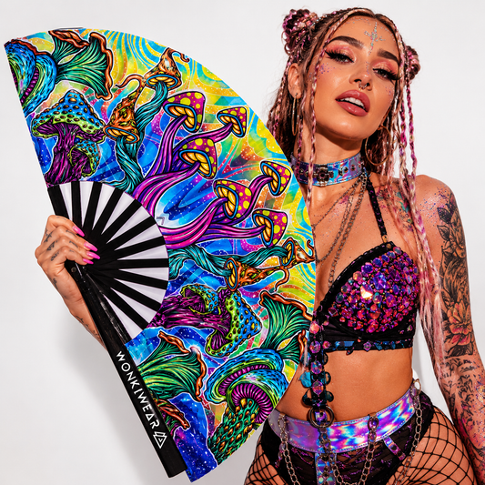 Festival model posing with XL psychedelic mushroom festival fan by WonkiWear