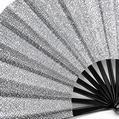 Close up glitter detail of silver festival folding fan