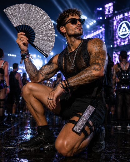 Male festival model wearing silver glitter fan holster and holding silver glitter rave fan