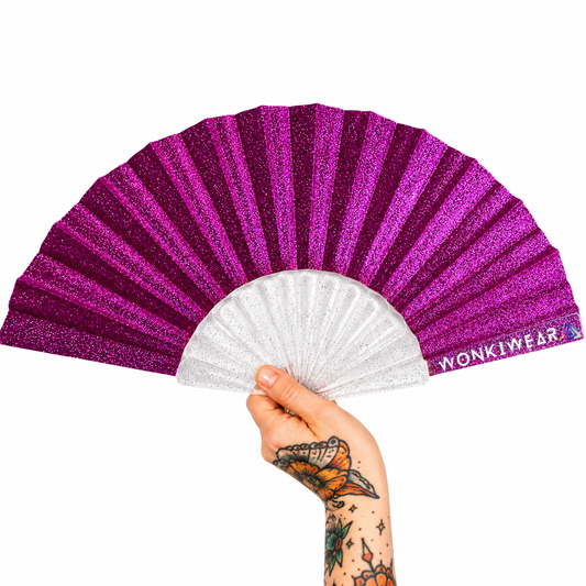 Small bright pink glitter folding festival fan with transparent glitter-filled ribs