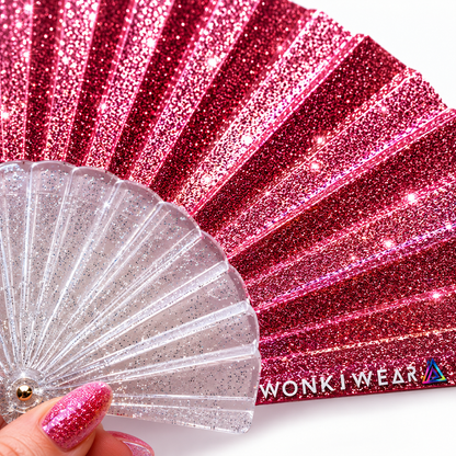 Macro close-up showing sparkling light pink glitter fabric detail