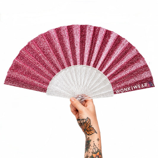 Small light pink glitter folding festival fan with transparent glitter-filled ribs