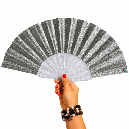 Small silver glitter folding festival fan with transparent glitter-filled plastic ribs and sparkling silver fabric