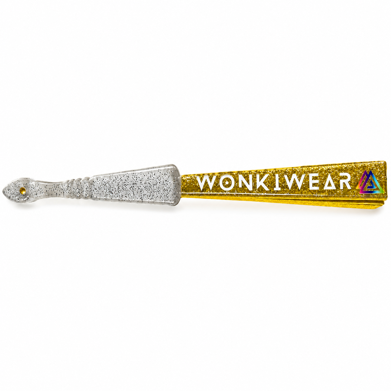 Close-up of folded yellow gold glitter fan showing transparent plastic handle with silver glitter speckles