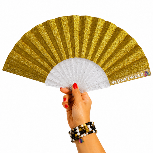 Small yellow gold glitter folding festival fan with transparent glitter-filled plastic ribs and sparkling gold fabric