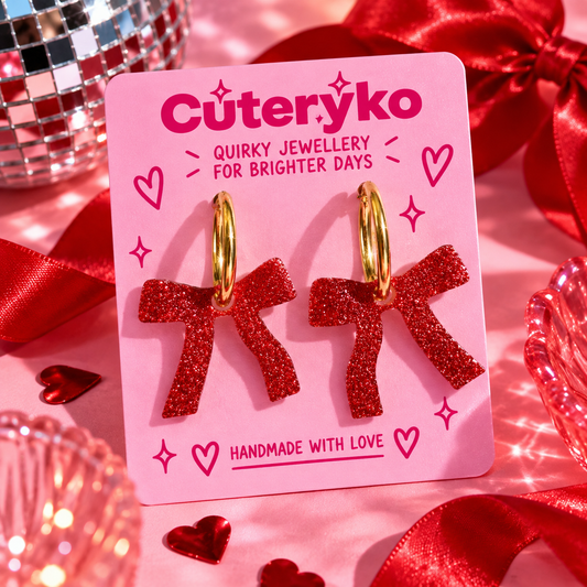 Sparkly red bow hoop earrings with glittery bow charms by Cuteryko