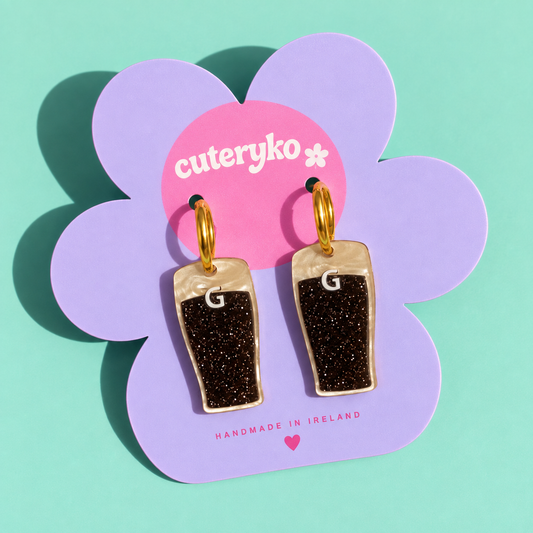 Split the G stout hoop earrings with glittery Irish pint charms by Cuteryko