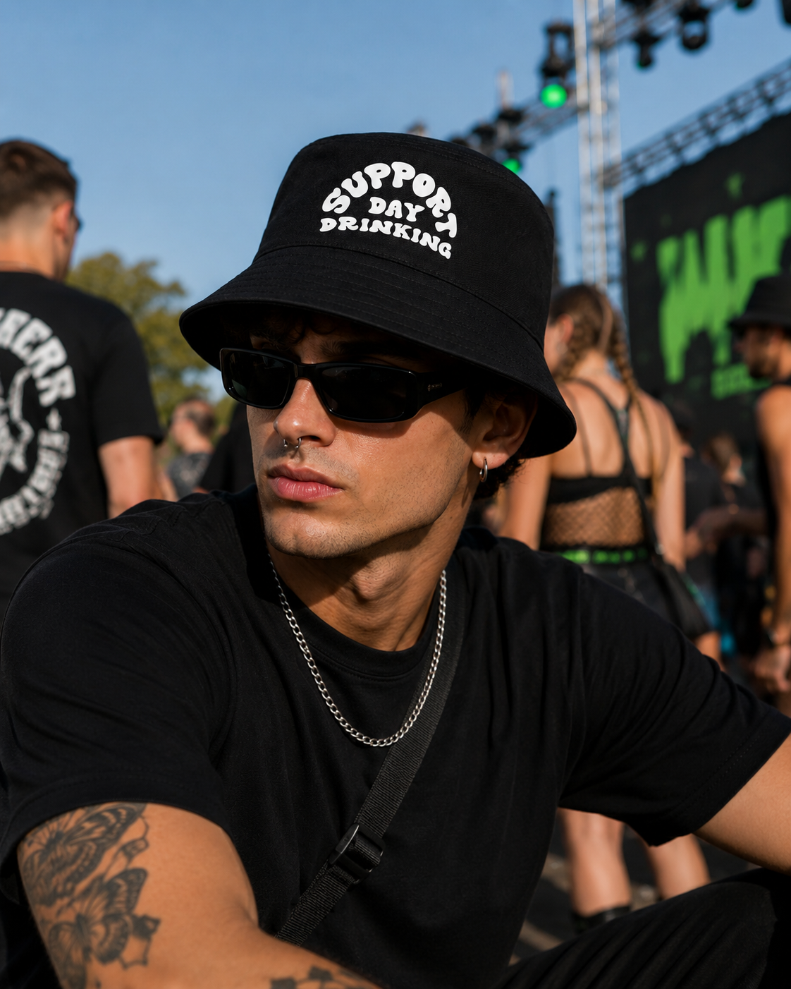 Male model wearing black Support Day Drinking bucket hat