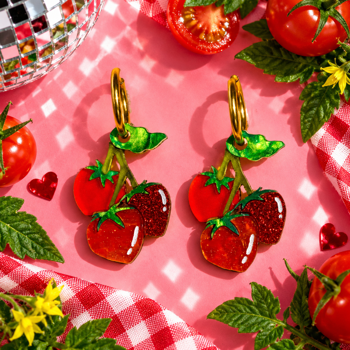Tomato Vine Hoop Earrings with three colourful tomato charms and green leafy vine details by Cuteryko