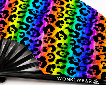 Close up detail of UV reactive rainbow leopard print rave fan fabric and bamboo ribs