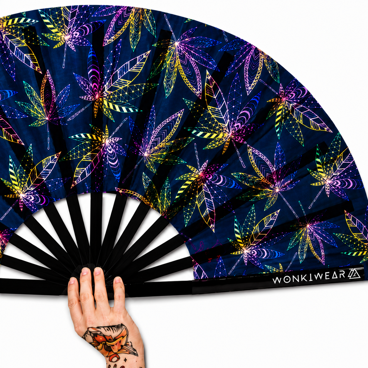 Close-up detail of UV reactive rave fan showing Mary Jane leaf design and bamboo ribs