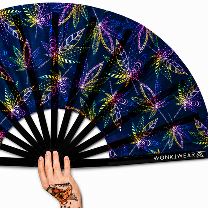 Close-up detail of UV reactive rave fan showing Mary Jane leaf design and bamboo ribs