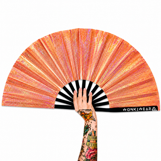 Venus Galaxy XL festival fan with metallic orange holographic finish and rainbow reflective details