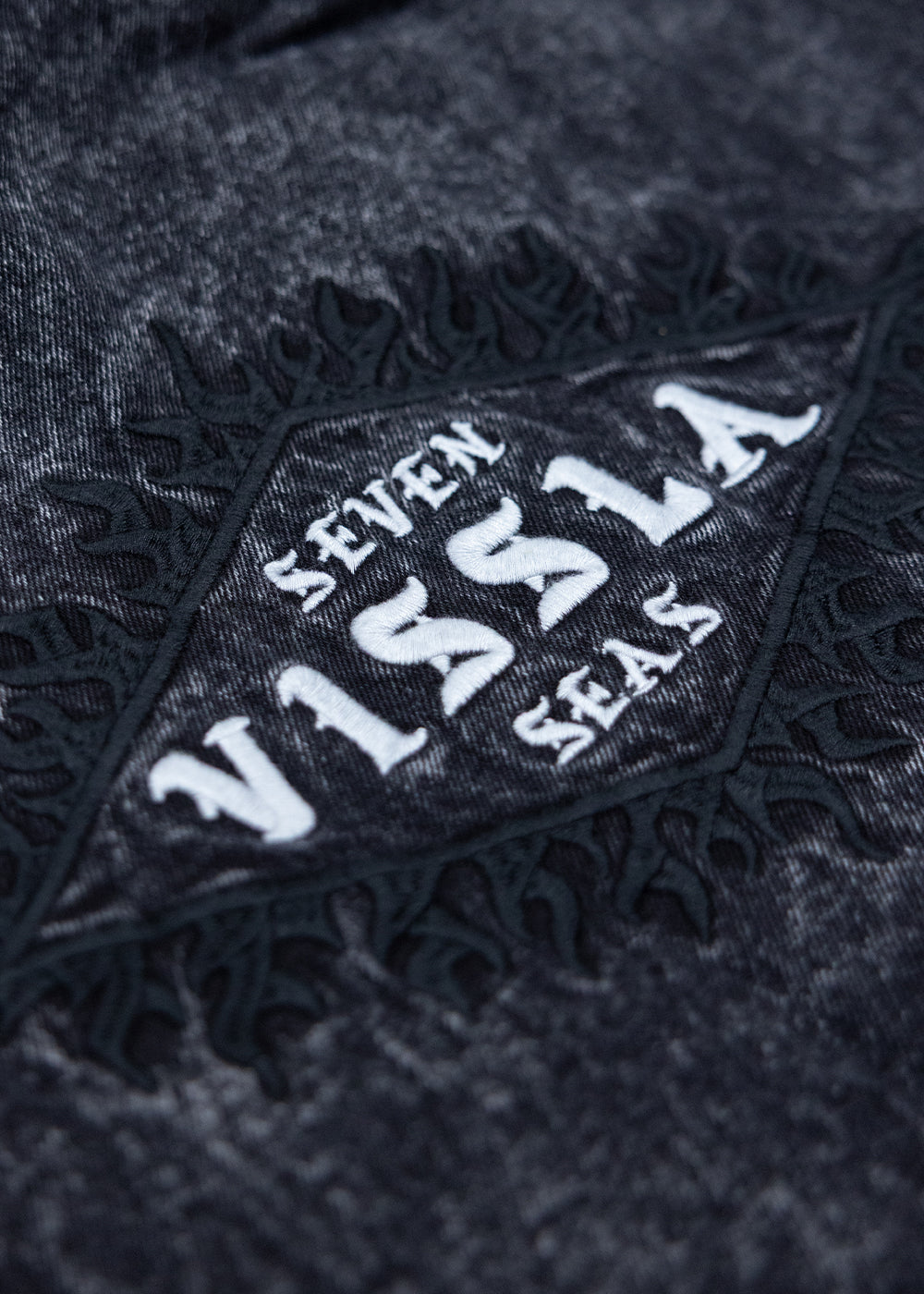 Close-up of the embroidered Seven Vissla Seas design on the back of the Wasson jacket