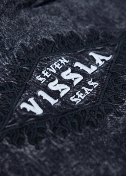 Close-up of the embroidered Seven Vissla Seas design on the back of the Wasson jacket