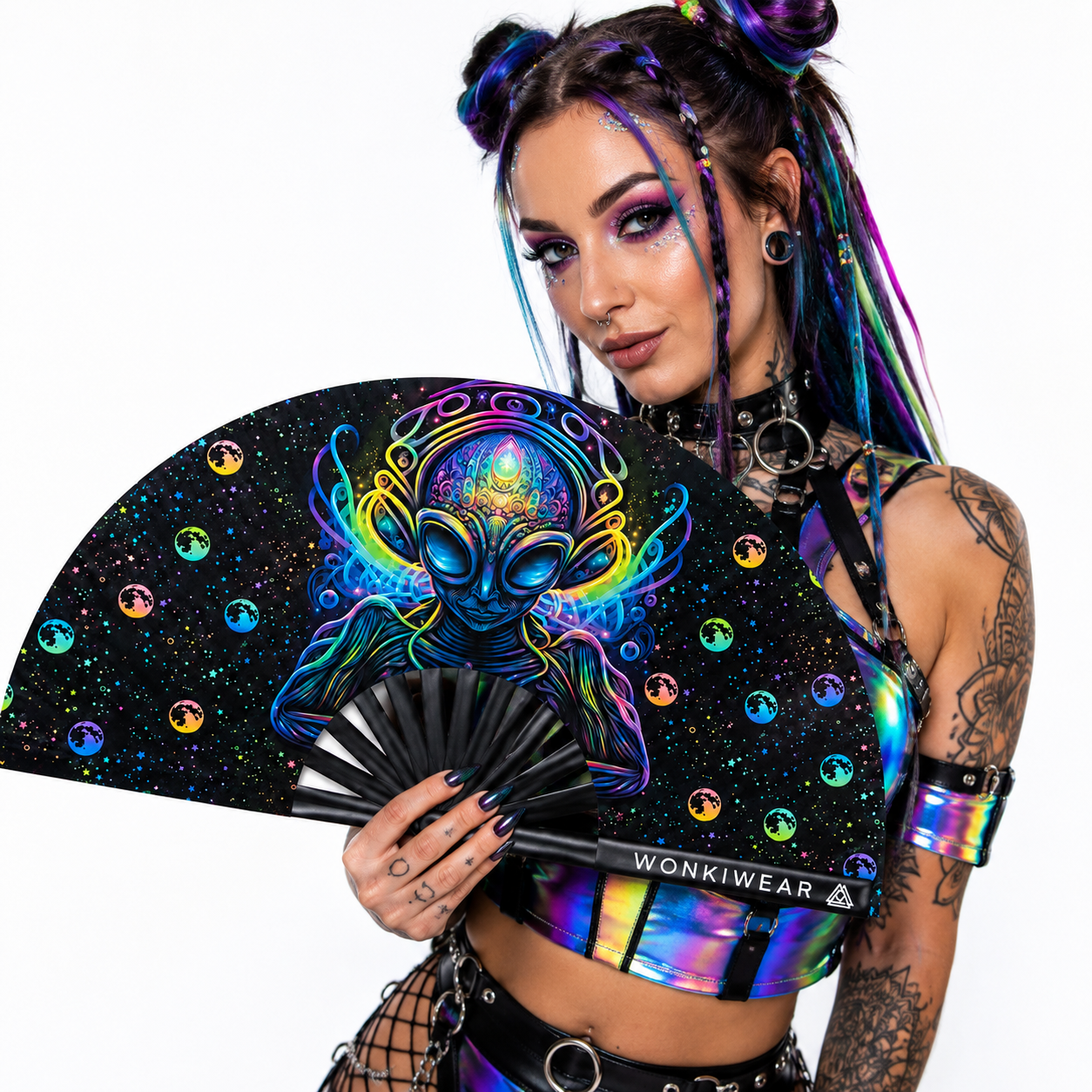 Festival model holding the Voidwalker psychedelic alien XL folding fan in a studio photoshoot