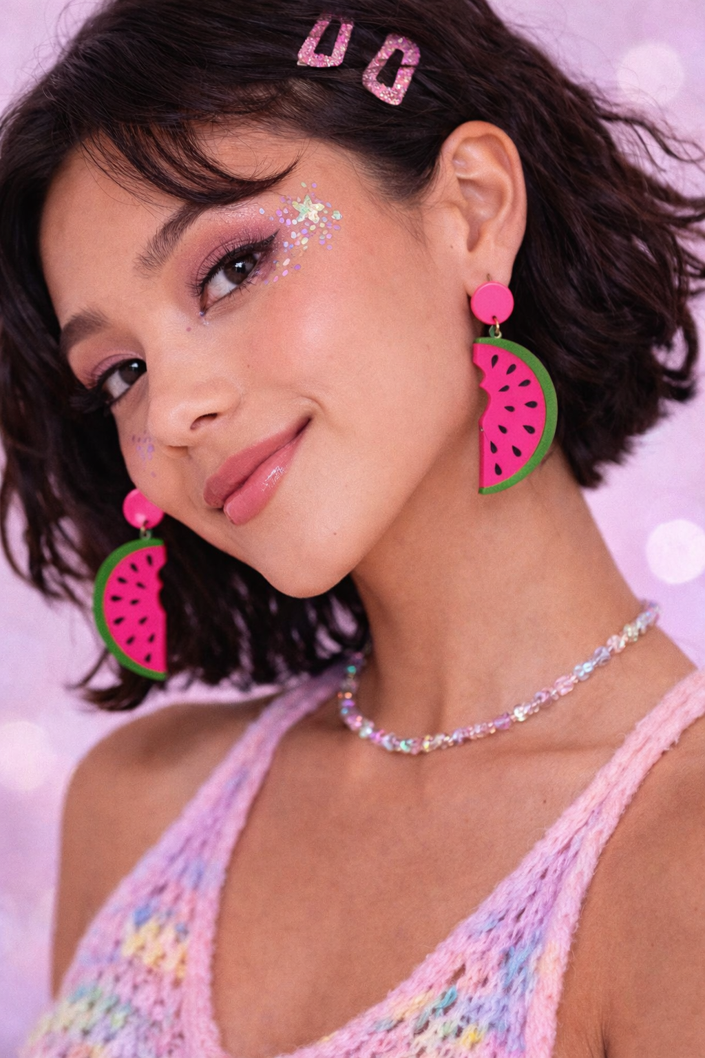 Model wearing watermelon earrings festival styling
