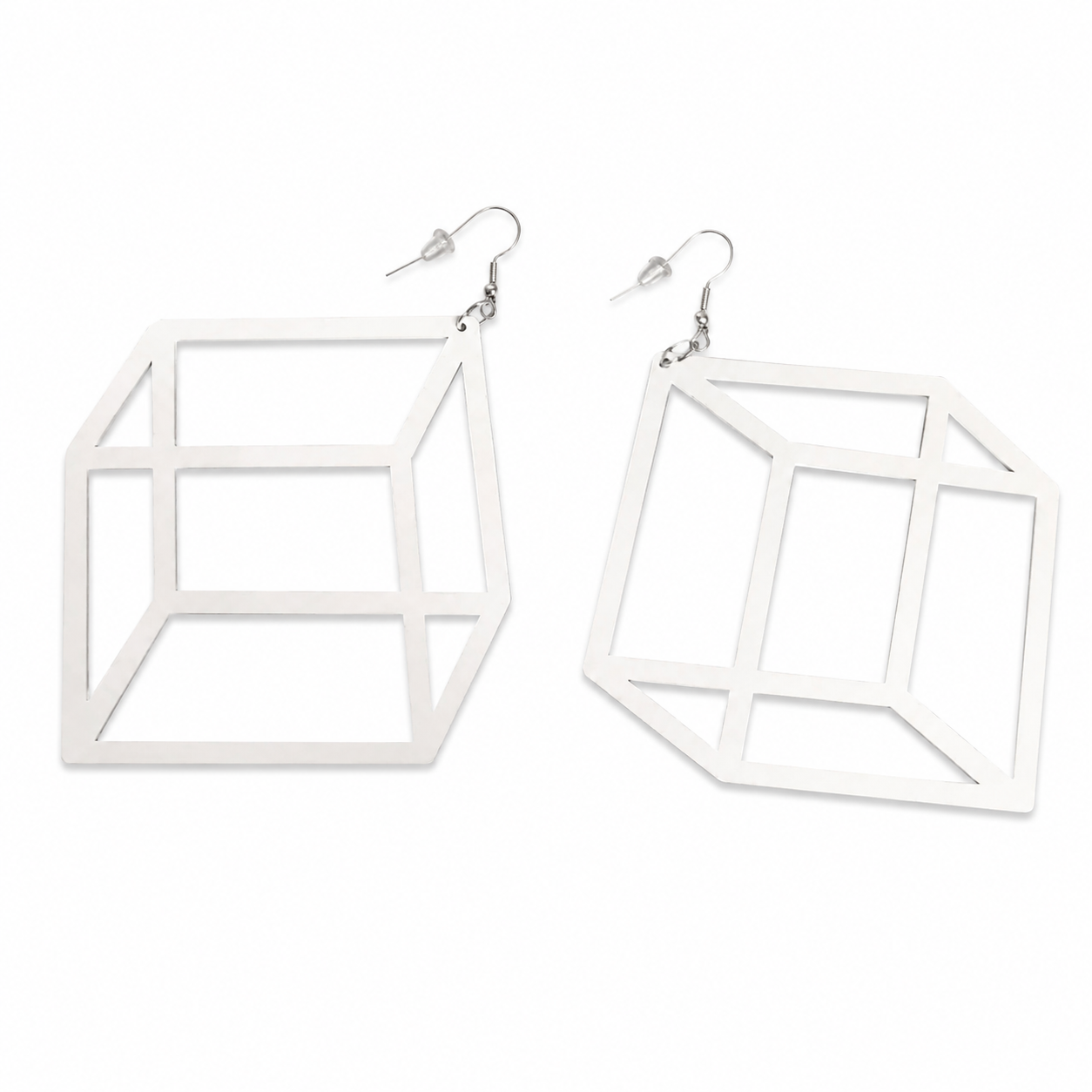 White geometric 3D illusion cube statement earrings on white background