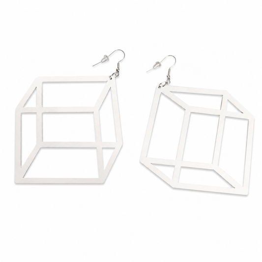 White geometric 3D illusion cube statement earrings on white background