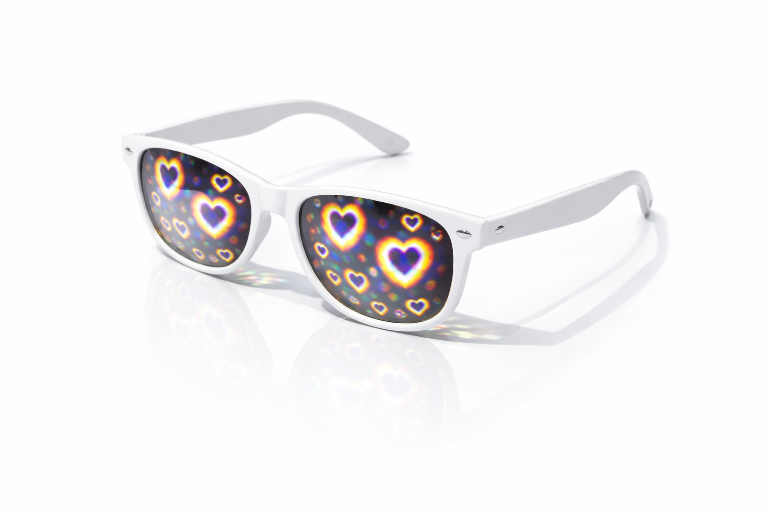 White frame heart diffraction glasses with rainbow love heart light effect lenses on a clean background
