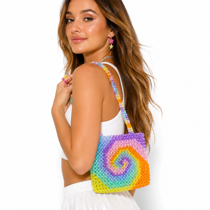 Festival model wearing handmade rainbow beaded shoulder bag