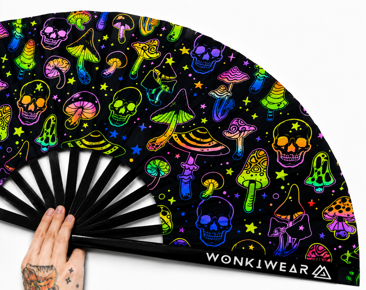 Close up detail of UV reactive mushroom and skulls festival fan fabric and black bamboo ribs