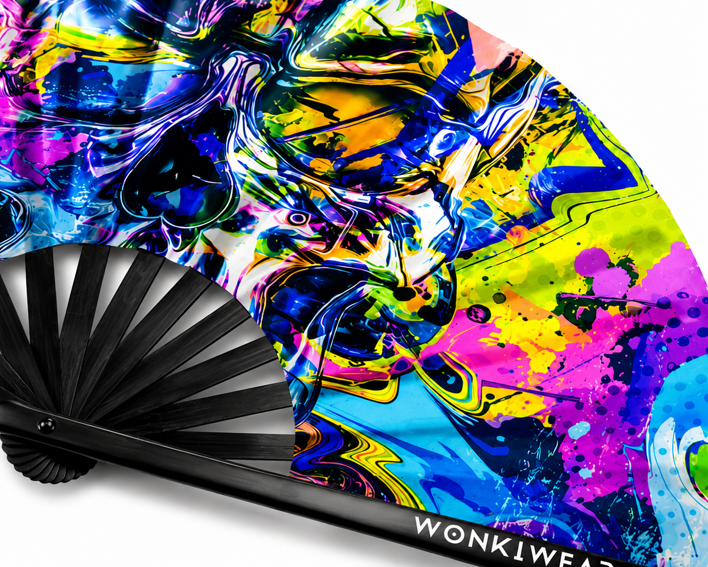 Close up detail of neon graffiti skull UV reactive rave fan fabric and black bamboo ribs