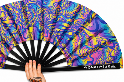 Close up detail of psychedelic UV reactive rave fan print and black bamboo ribs