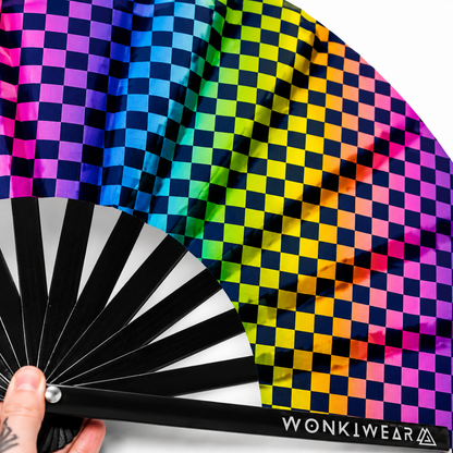 Close up detail of checkerboard UV reactive rave fan print and black bamboo ribs