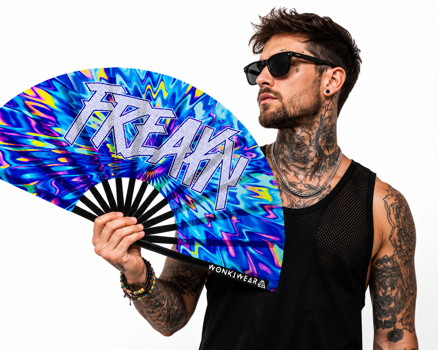 Male festival model holding XL UV reactive FREAKY rave fan
