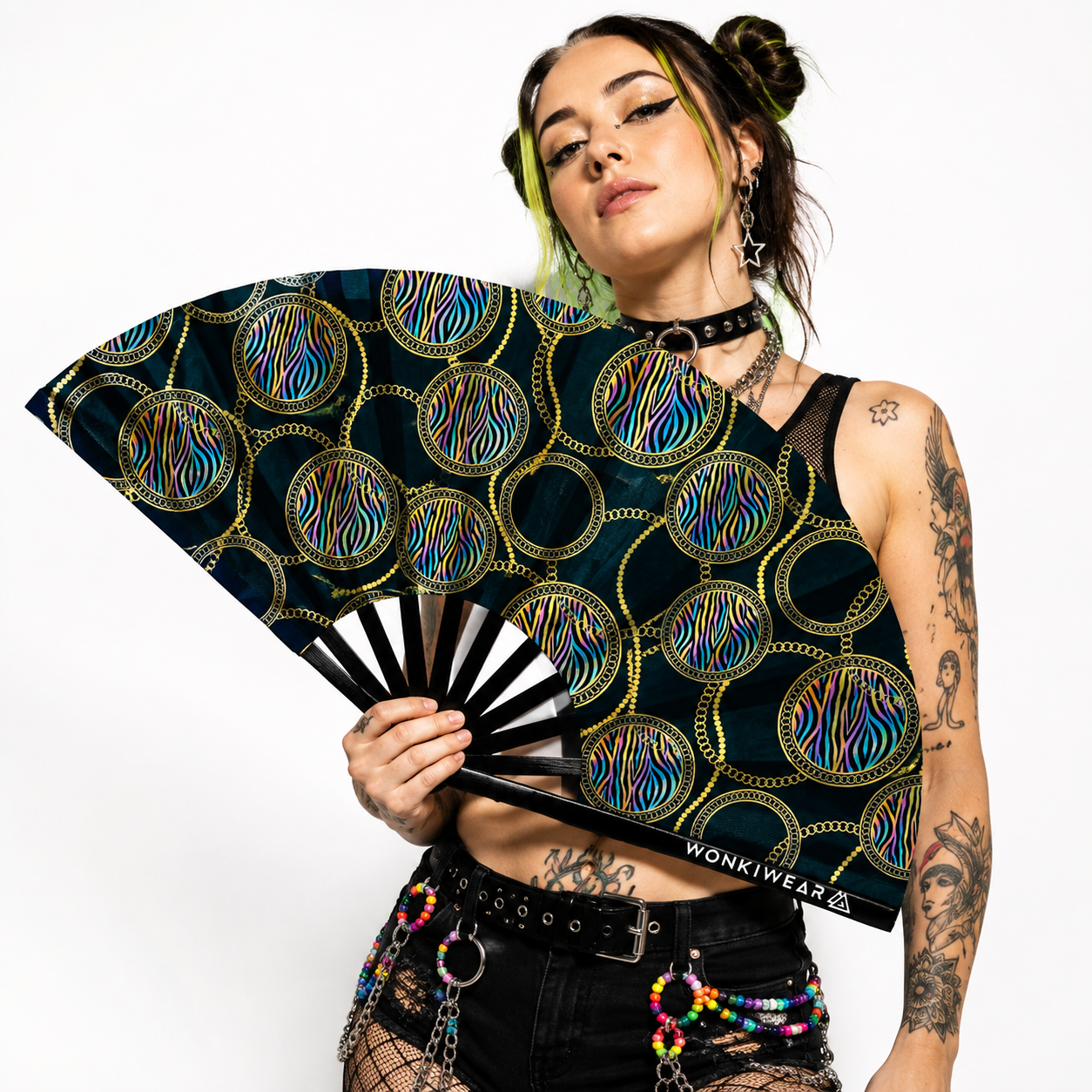 Festival model holding XL UV reactive luxury rave fan