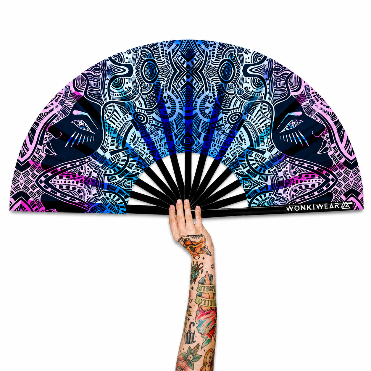 XL UV reactive tribal psytrance festival fan with black bamboo ribs on white background