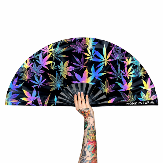 XL iridescent leaf festival fan by Wonkiwear with rainbow reflective cannabis leaf design on black fabric