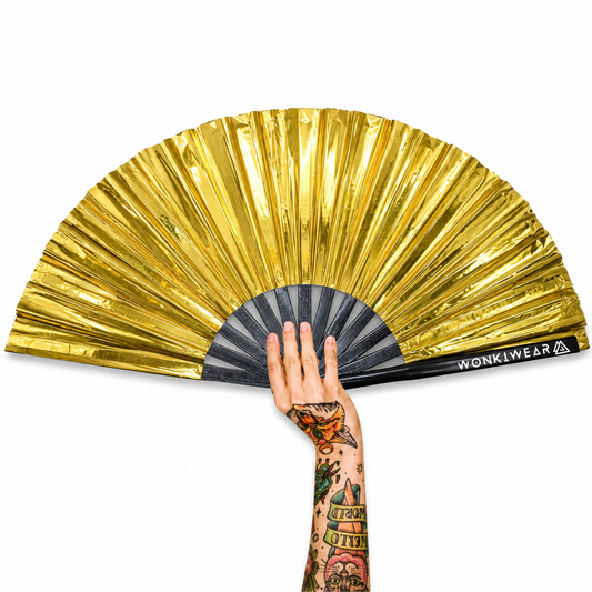 XL metallic gold PVC festival rave fan by WonkiWear open on white background