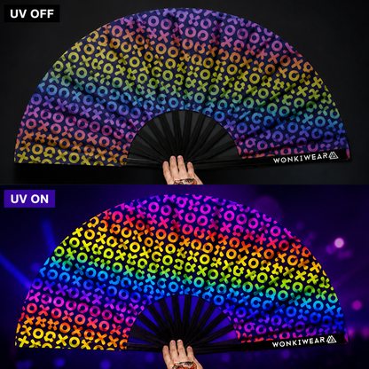 Comparison of XL XOXO rave fan in normal lighting and glowing under UV blacklight