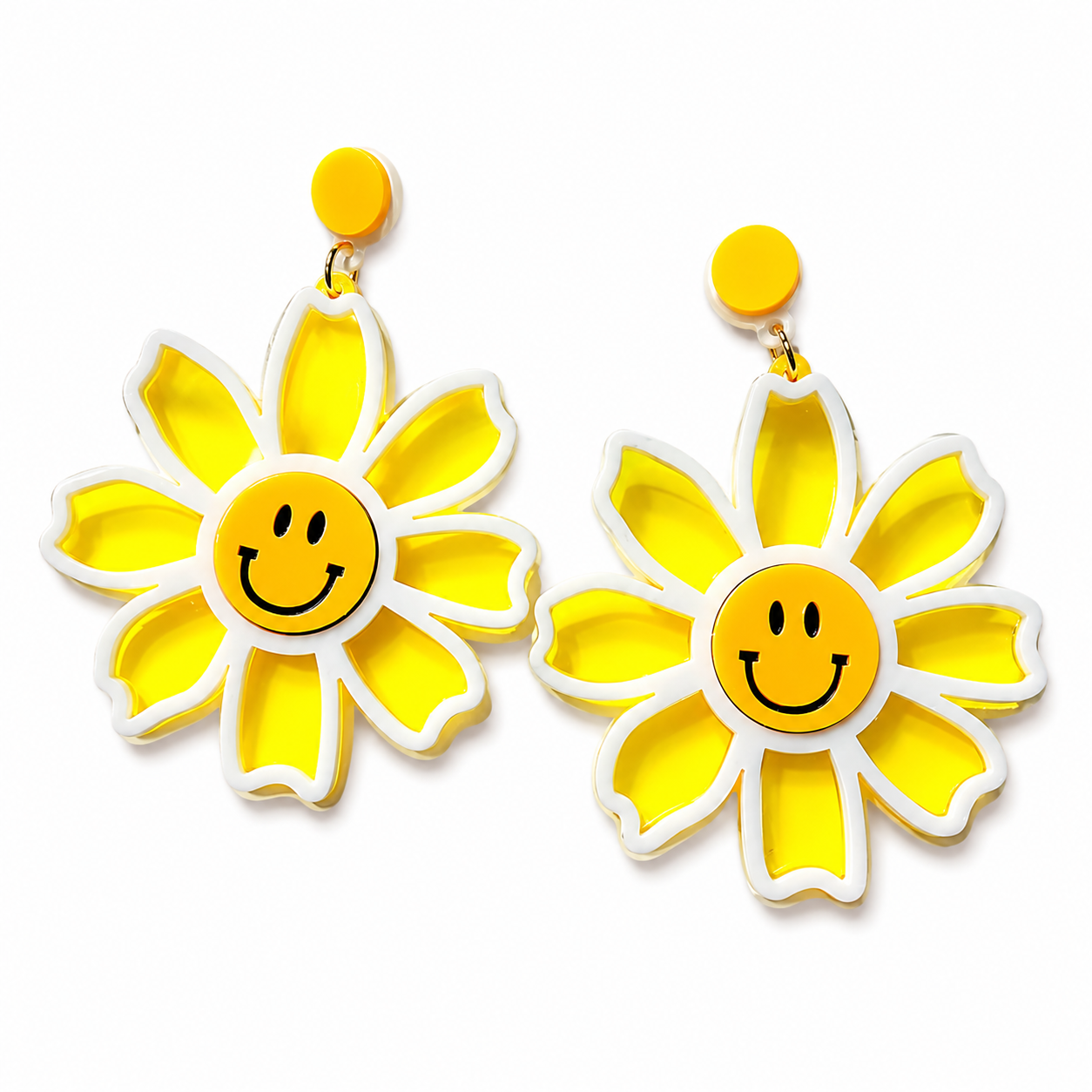 Oversized yellow sun catcher daisy smiley earrings on white background
