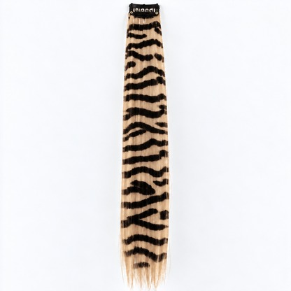 Beige and black zebra-striped clip-in hair extension with long synthetic strands.