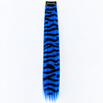 Blue and black zebra-striped clip-in hair extension with long synthetic strands.