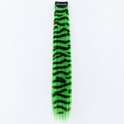 Green and black zebra-striped clip-in hair extension with long synthetic strands.
