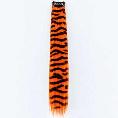 Orange and black zebra-striped clip-in hair extension with long synthetic strands.