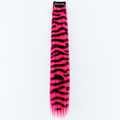 Pink and black zebra-striped clip-in hair extension with long synthetic strands.