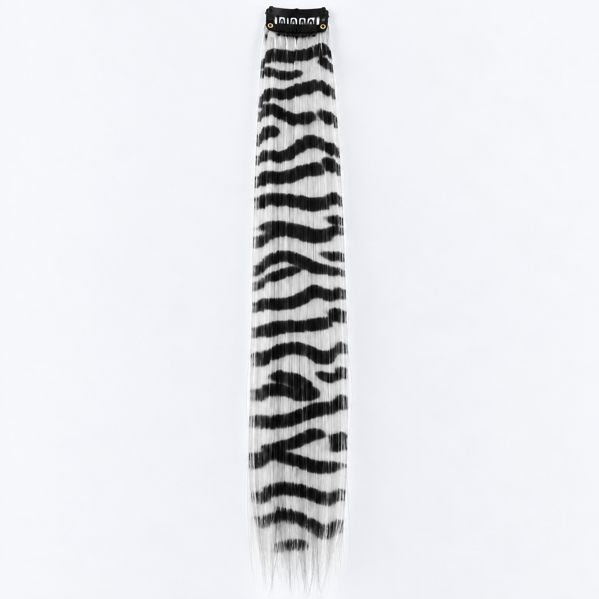White and black zebra-striped clip-in hair extension with long synthetic strands.