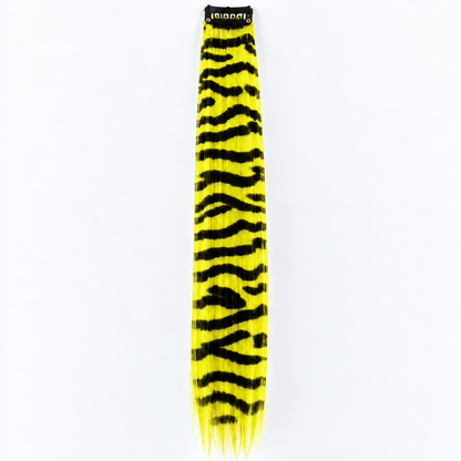 Yellow and black zebra-striped clip-in hair extension with long synthetic strands.